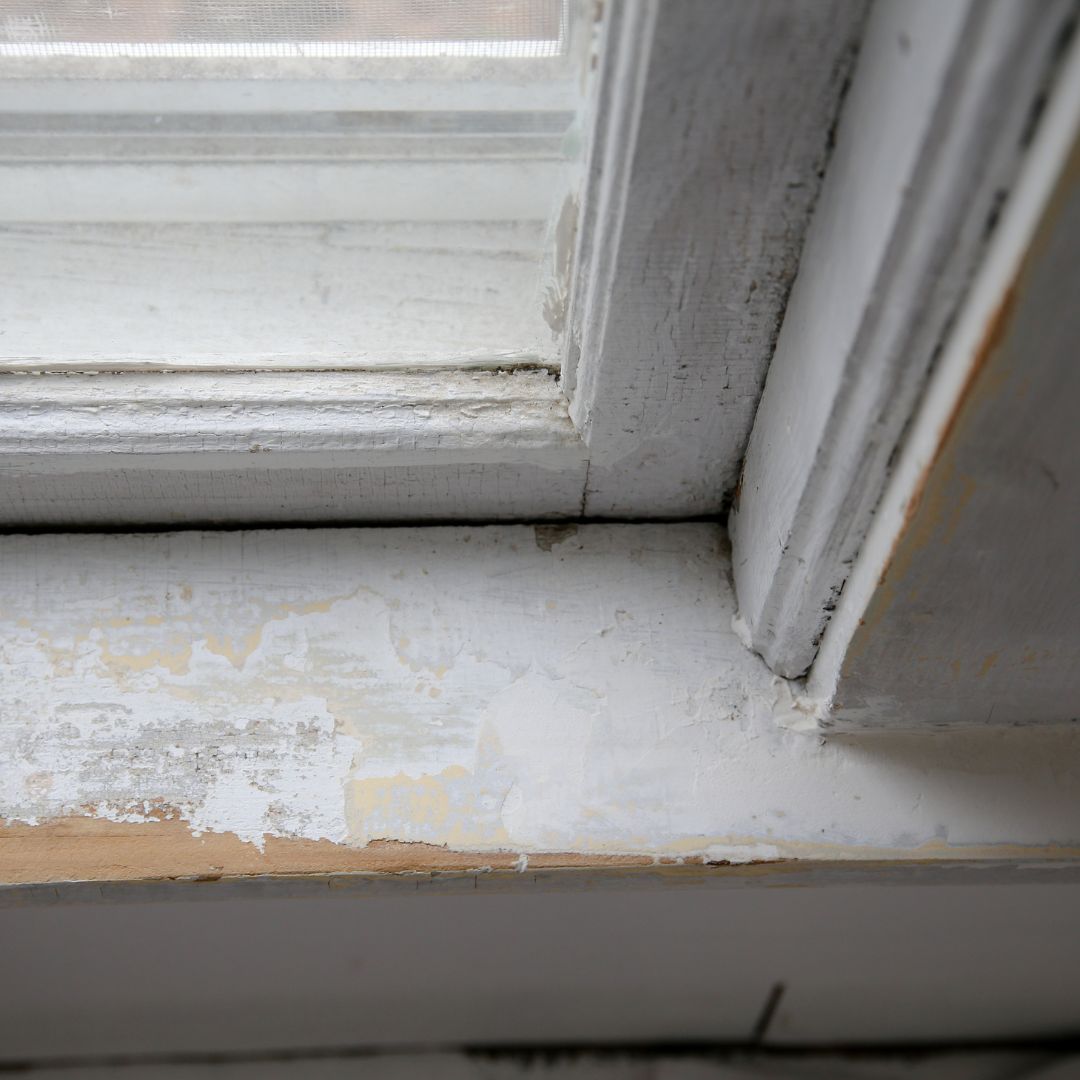 chipping paint off window sill