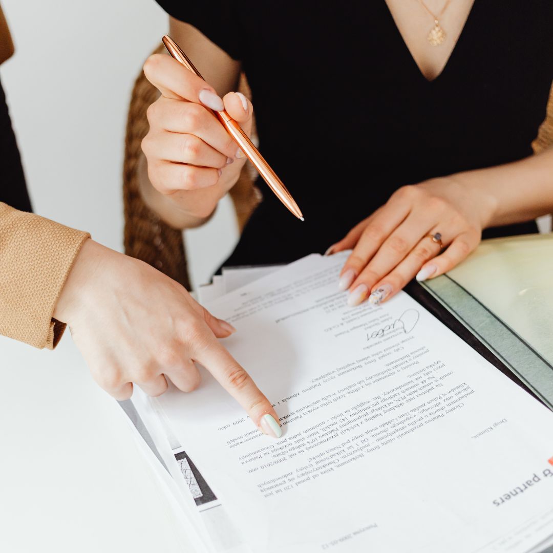 two people going over paperwork